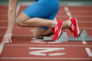 Runner on starting blocks