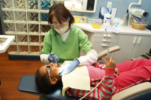 Child getting a dental exam