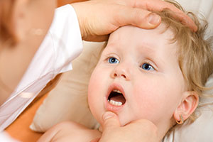 Toddler getting dental exam