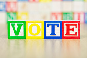 Letter blocks that spell "VOTE"