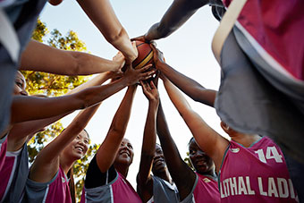 Basketball team huddle