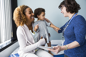 Mom and baby with pediatrician