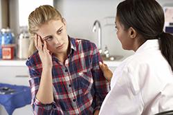Teen with doctor
